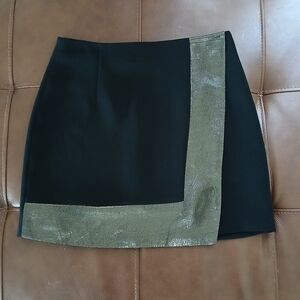 SANDRO PARIS MINI SKIRT WITH GOLD DETAIL‎